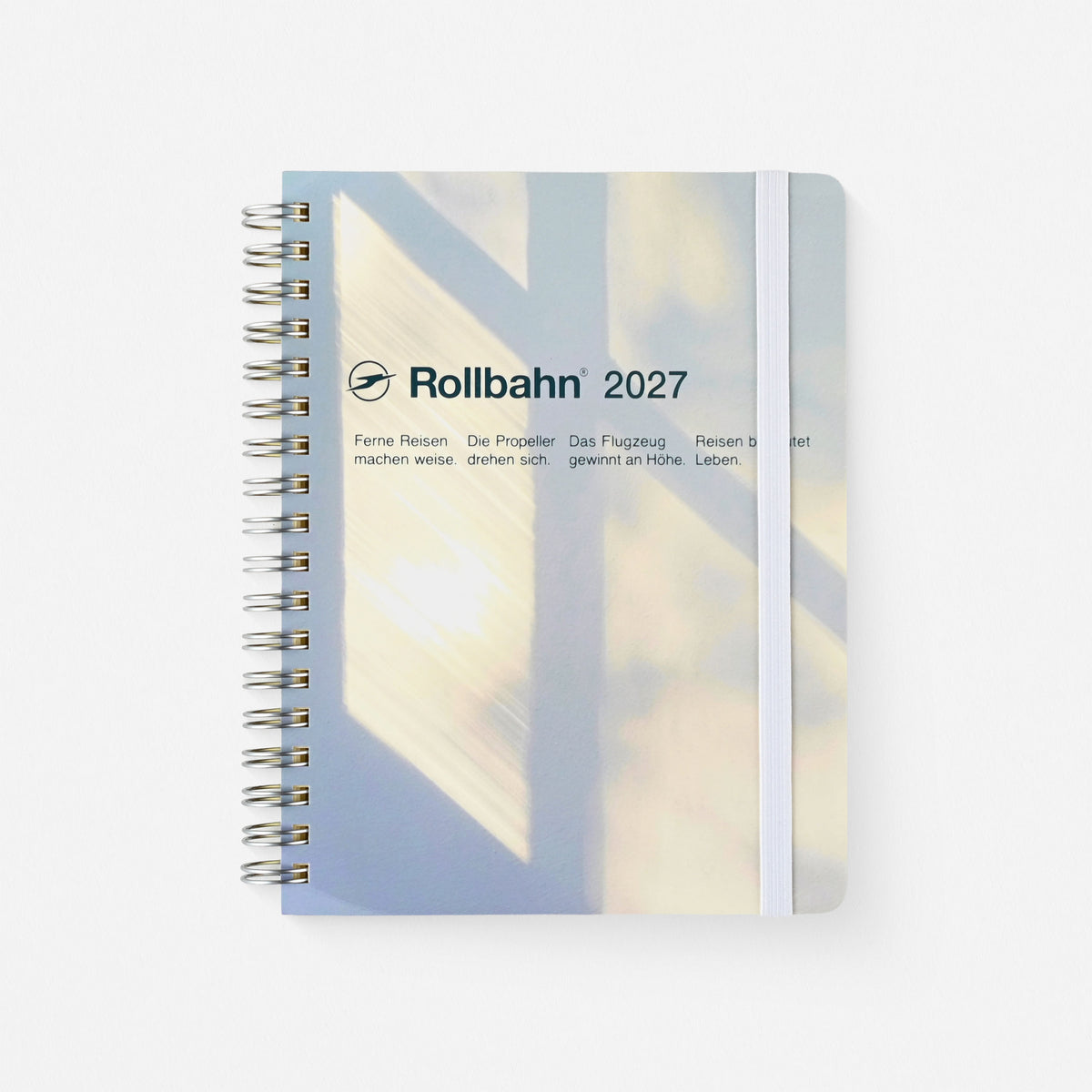 2027 Rollbahn planner Sunlight Version A with a light blue and cream photo of shadow created by sunlight streaming through a window