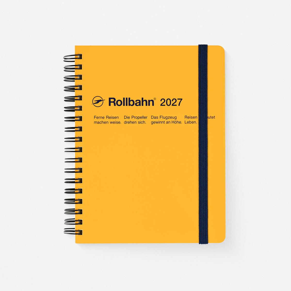 A 2027 Rollbahn planner with indigo printing, black spiral binding and navy elastic band